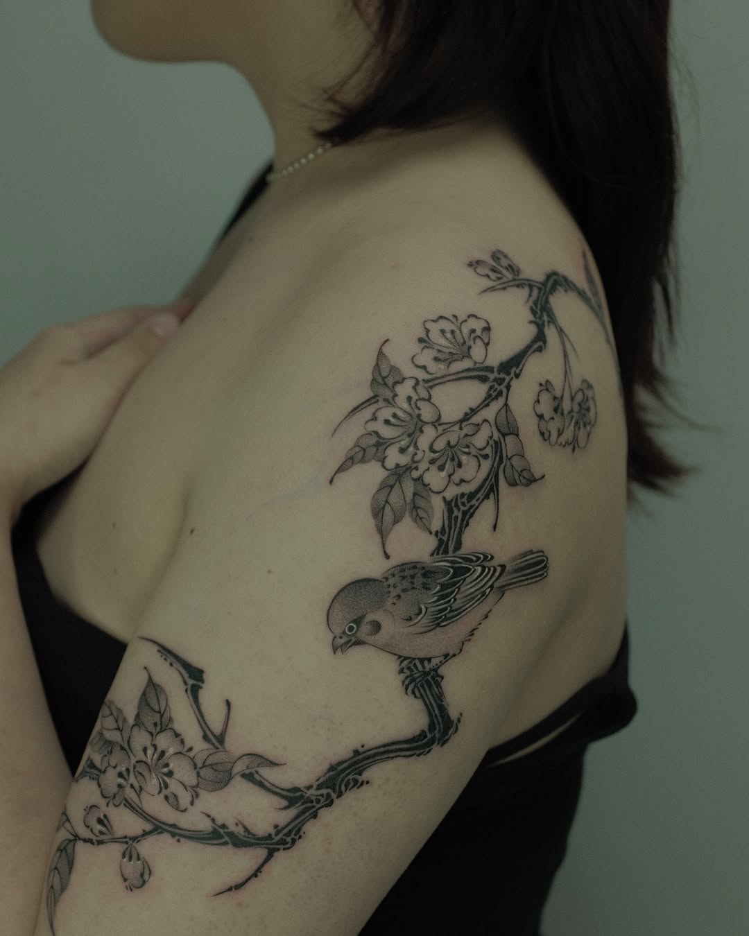 Tattoo by @xiaolun_tatt — black_and_grey, realism
