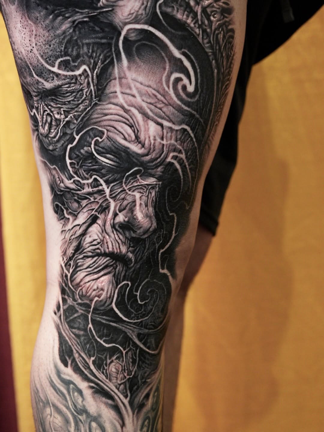 Tattoo by @inkbynico — dark_realism, black_and_grey