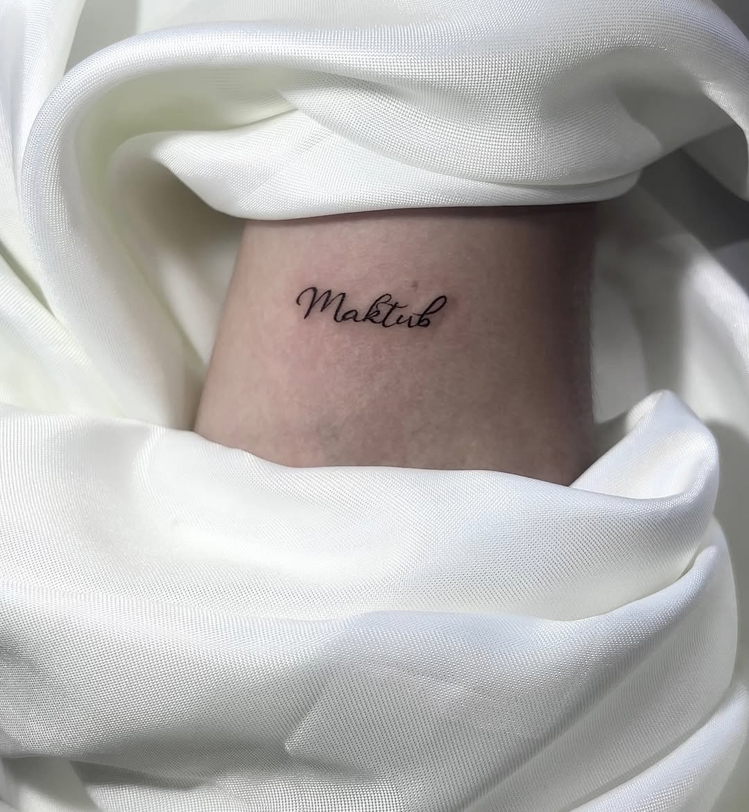 Tattoo by @deza.art — lettering_script, fine_line