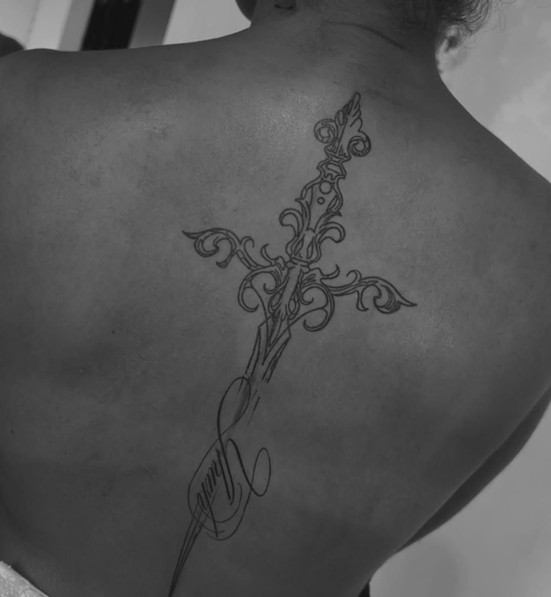 Tattoo by @deza.art — fine_line, lettering_script