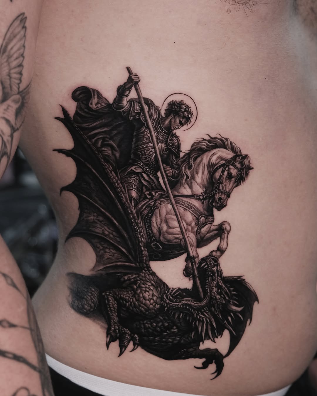 Tattoo by @by.daho โ realism, black_and_grey