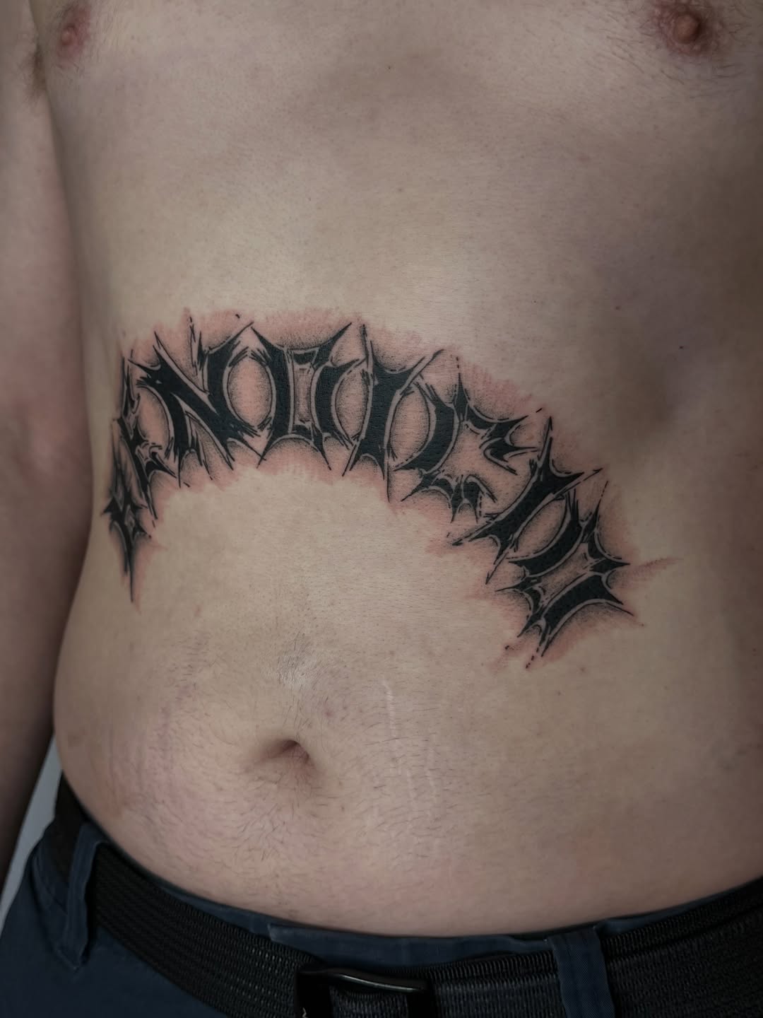 Tattoo by @zac.inks — lettering_script, blackwork