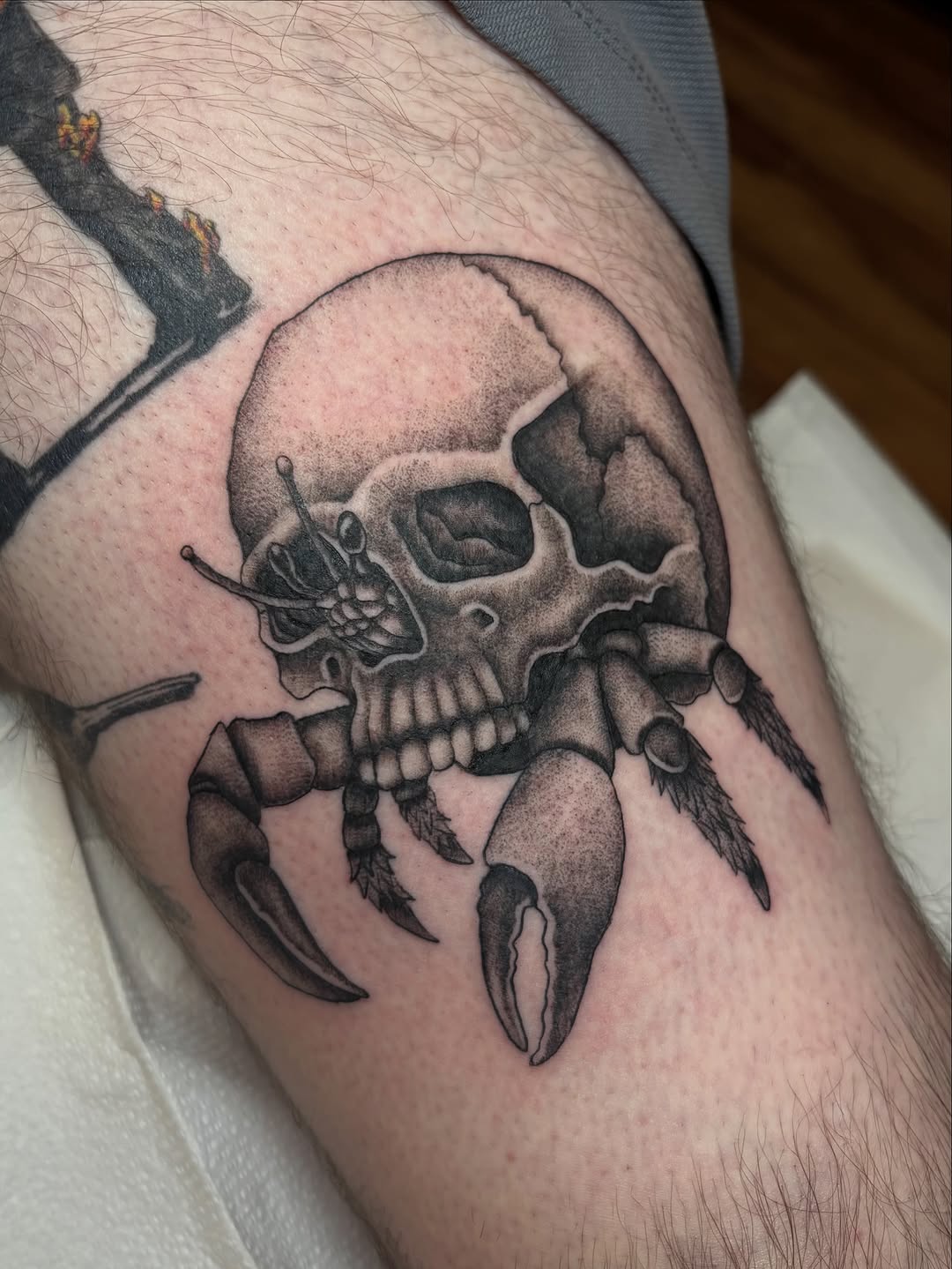 Tattoo by @tattoos.by.ang — realism, black_and_grey