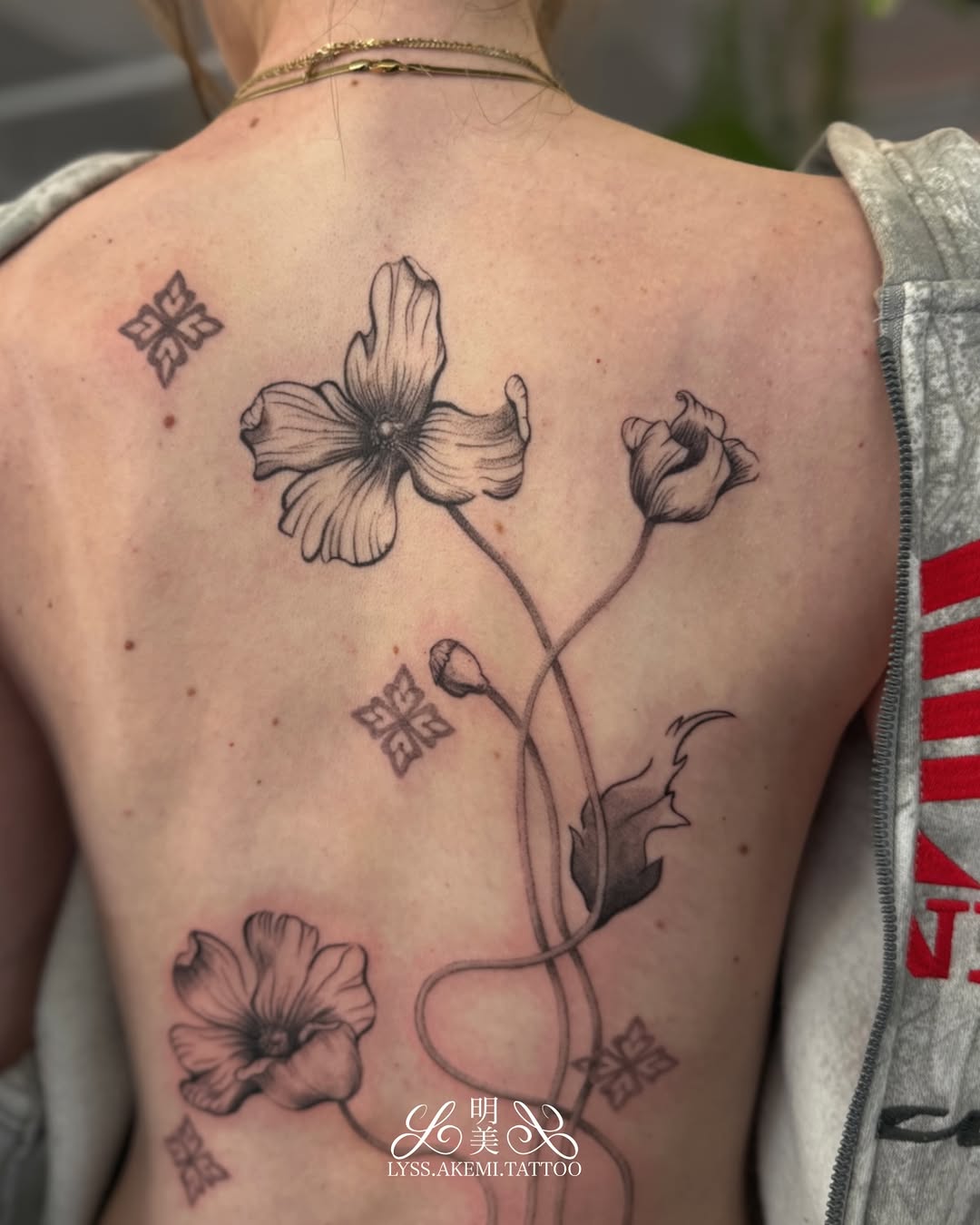 Tattoo by @lyss.akemi.tattoo — fine_line, black_and_grey