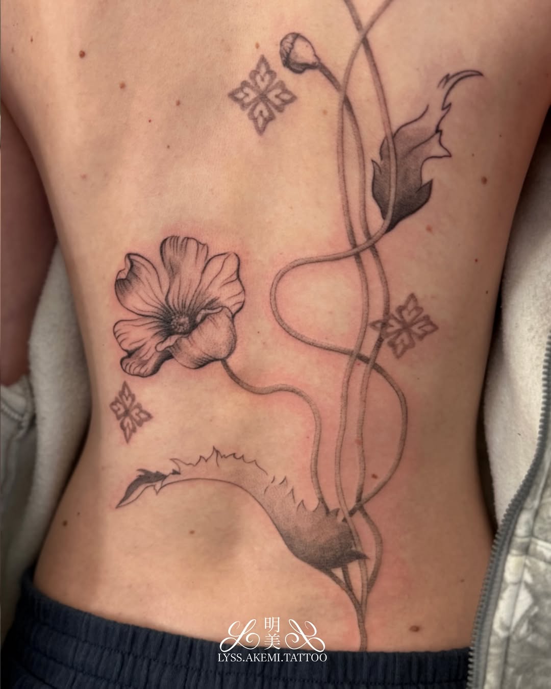Tattoo by @lyss.akemi.tattoo — fine_line, black_and_grey