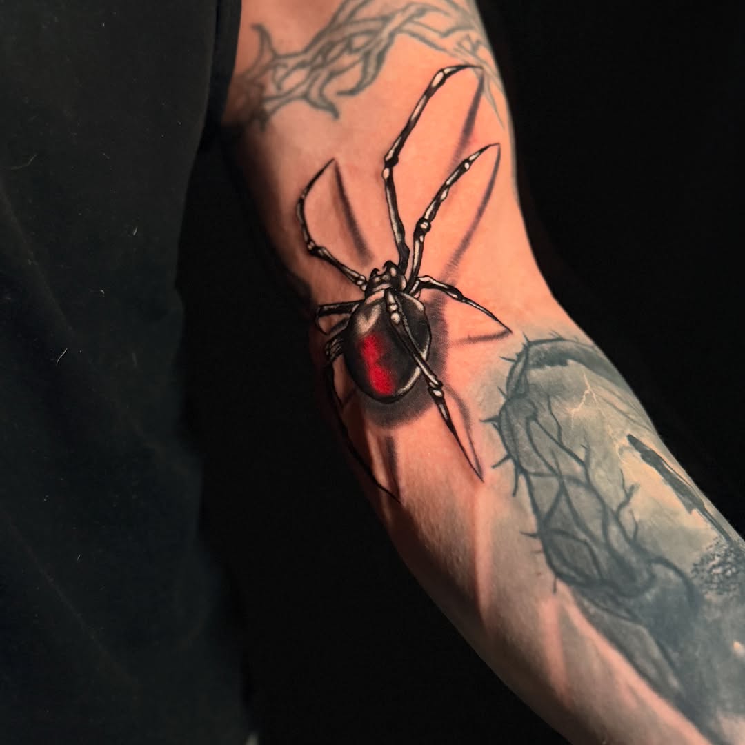 Tattoo by @tyhamiltontattoos โ realism, black_and_grey