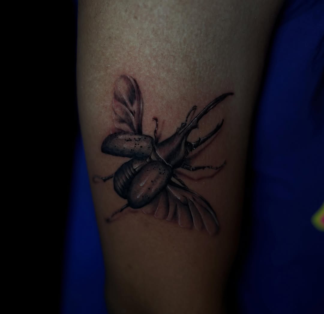 Tattoo by @sincitytattooer — realism, black_and_grey