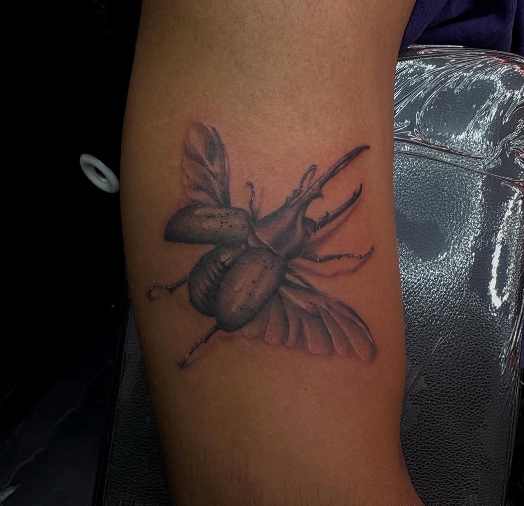 Tattoo by @sincitytattooer — realism, black_and_grey