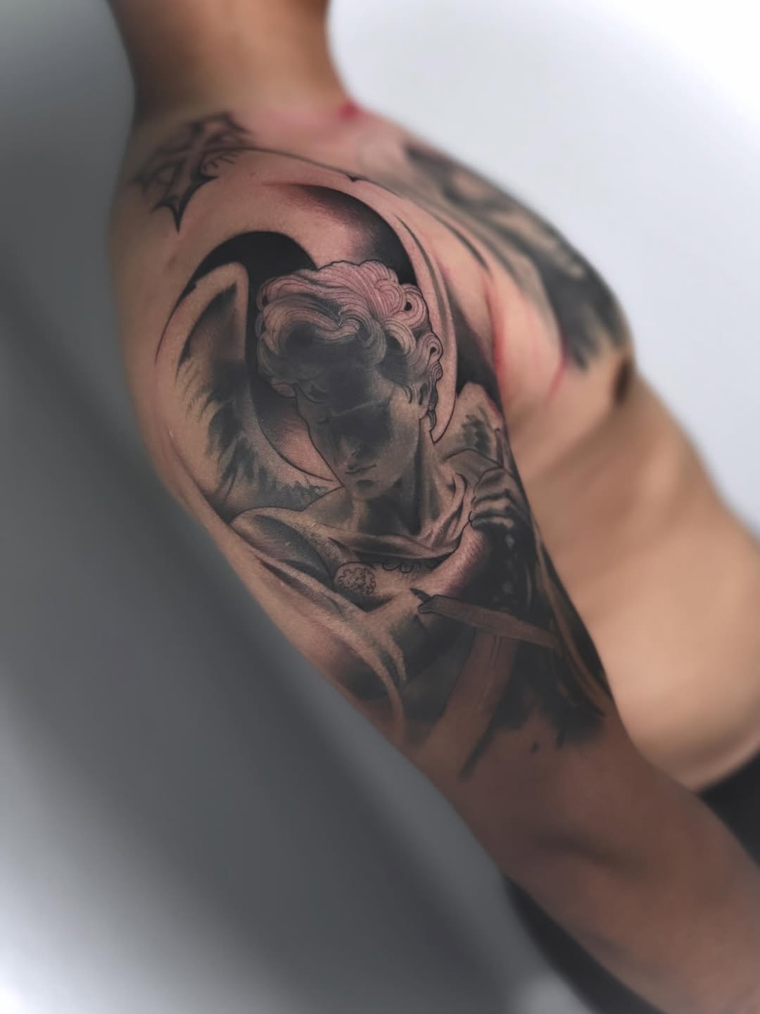 Tattoo by @lalo_inktattoos — realism, black_and_grey