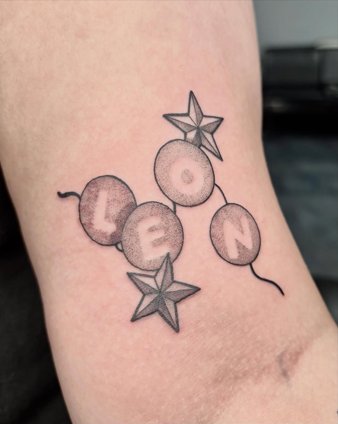Tattoo by @vang.studio — illustrative, lettering_script