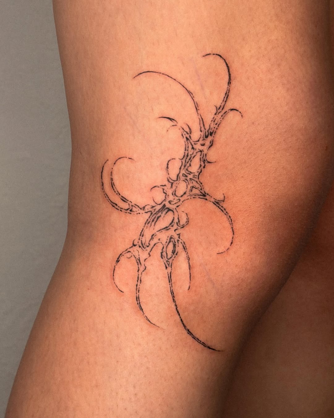 Tattoo by @tofuubrat — illustrative, blackwork