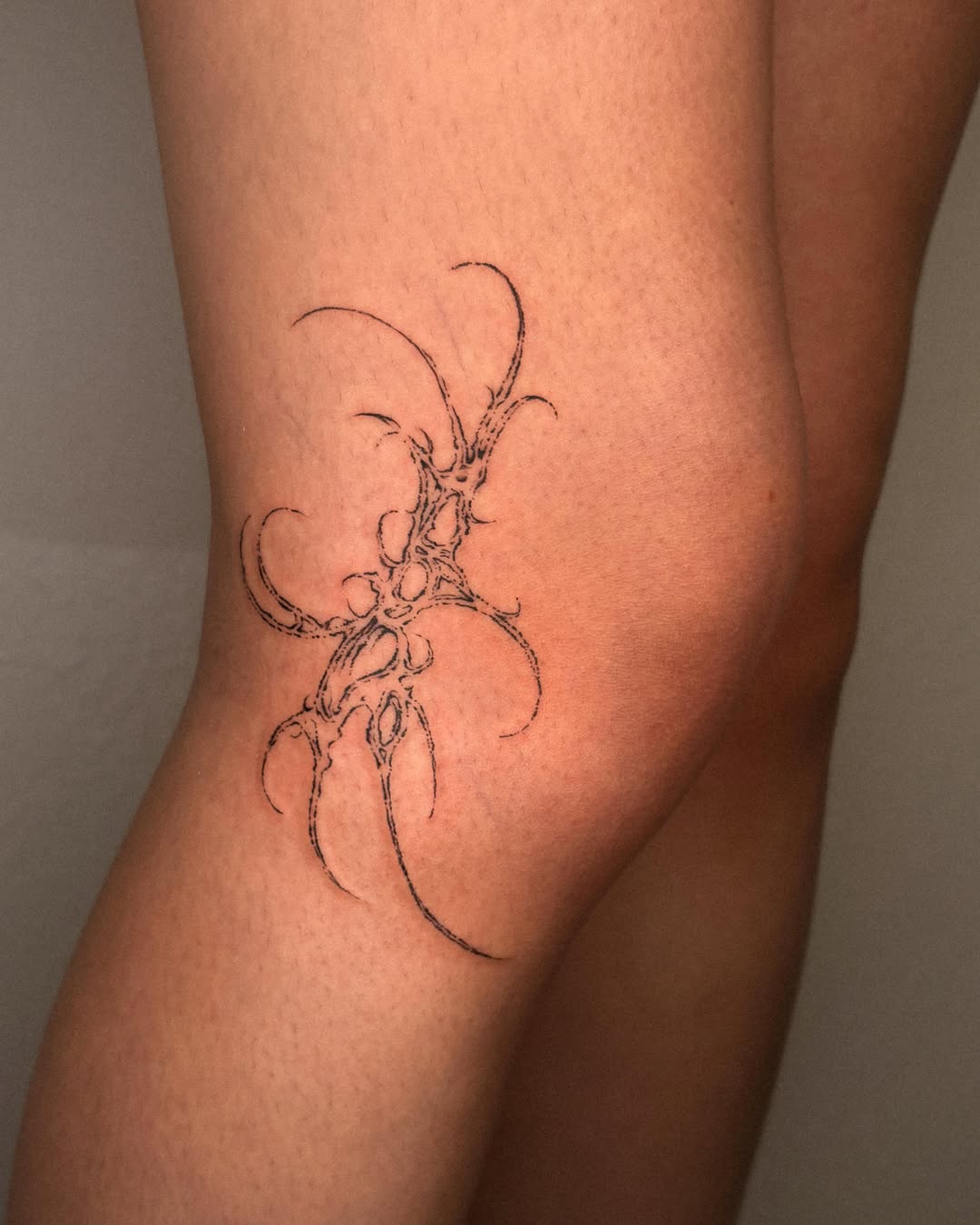 Tattoo by @tofuubrat — illustrative, blackwork