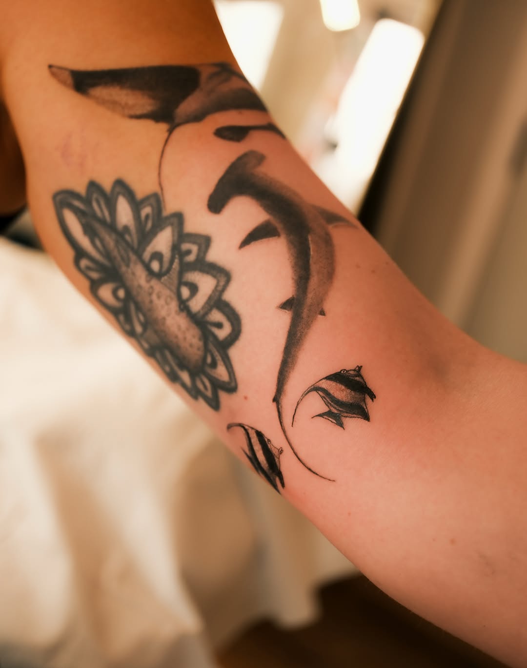 Tattoo by @homesick.tattoo — black_and_grey, realism