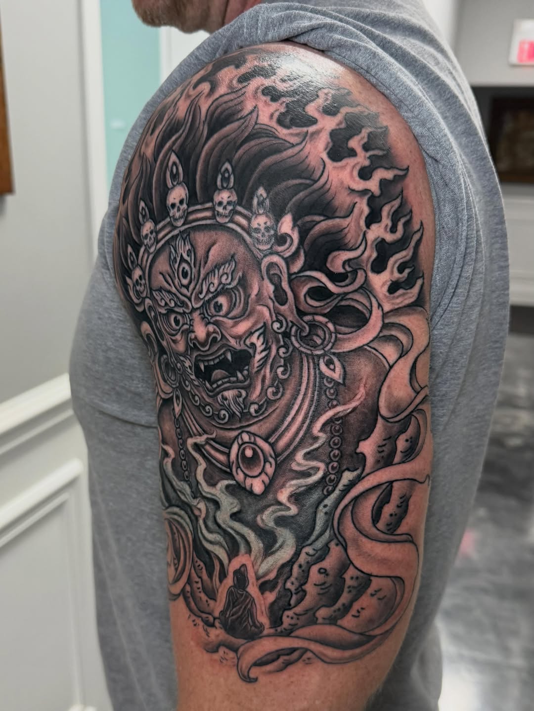 Tattoo by @mekong_lotus — black_and_grey, dark_realism