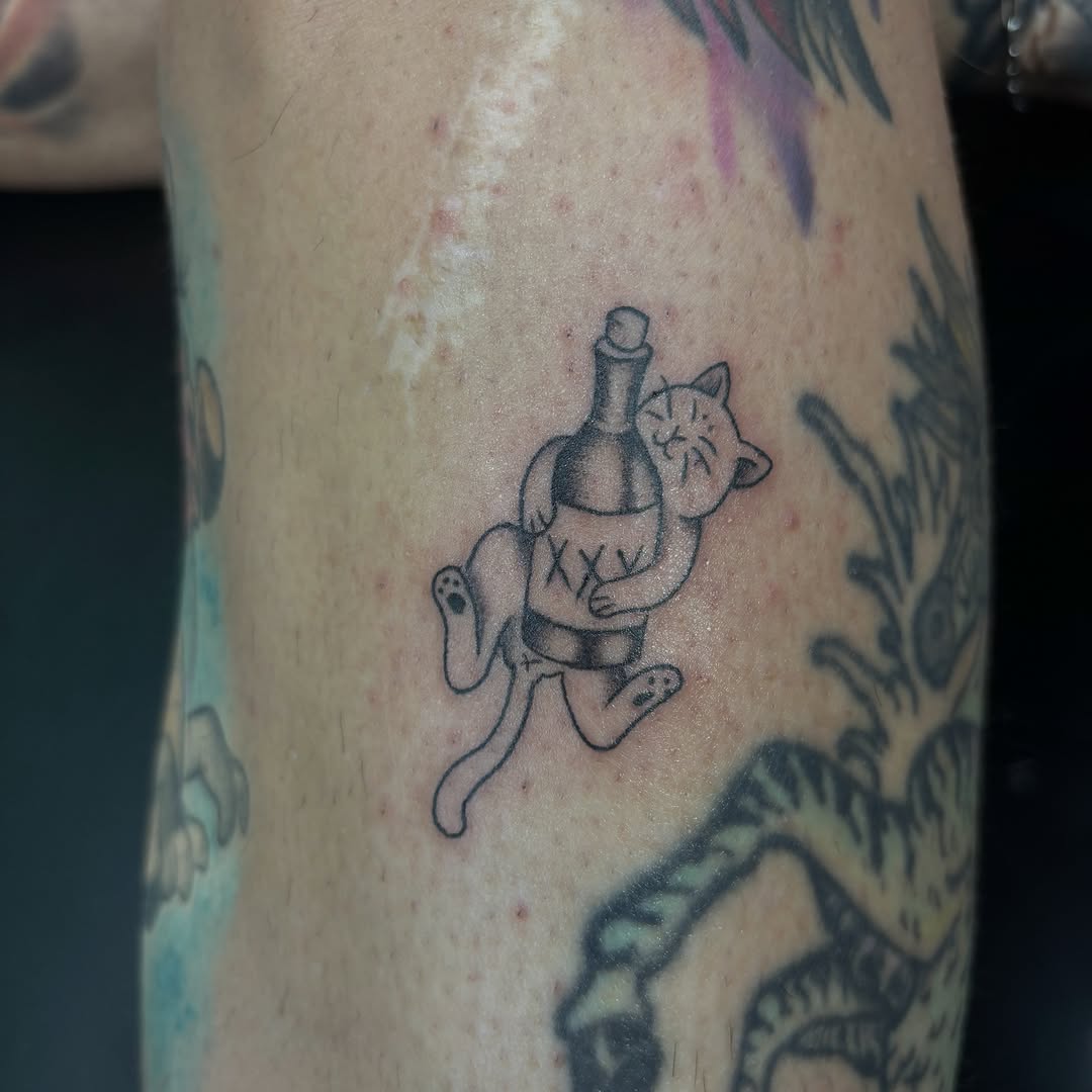 Tattoo by @vomit_goblin — illustrative, black_and_grey
