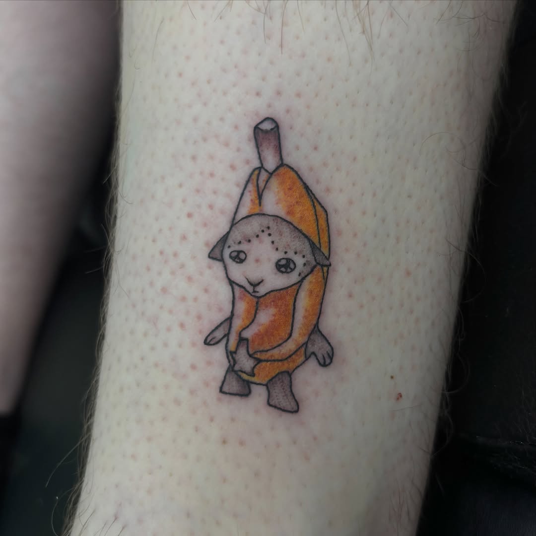 Tattoo by @vomit_goblin — illustrative, new_school