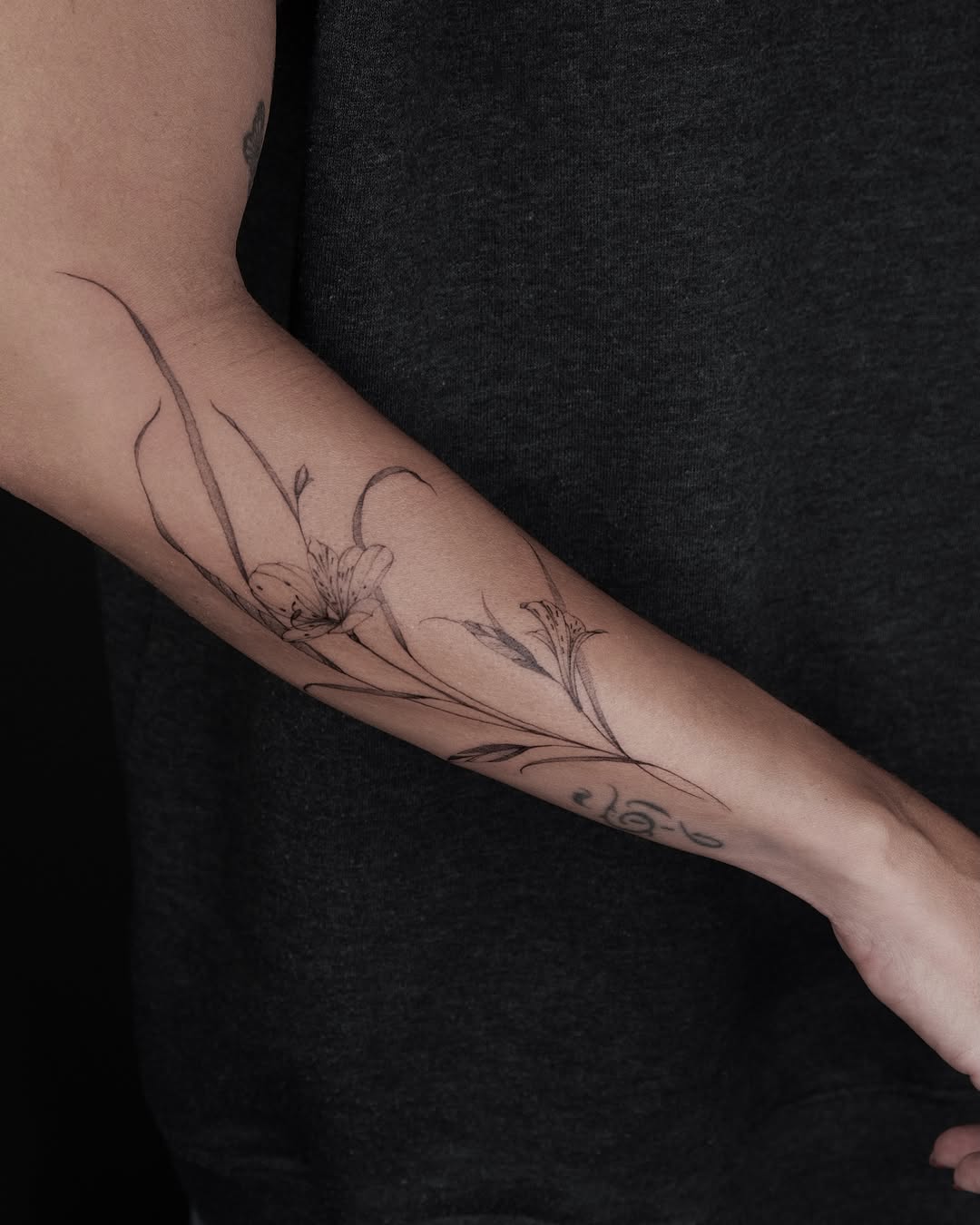 Tattoo by @corina.tattoo — fine_line, black_and_grey