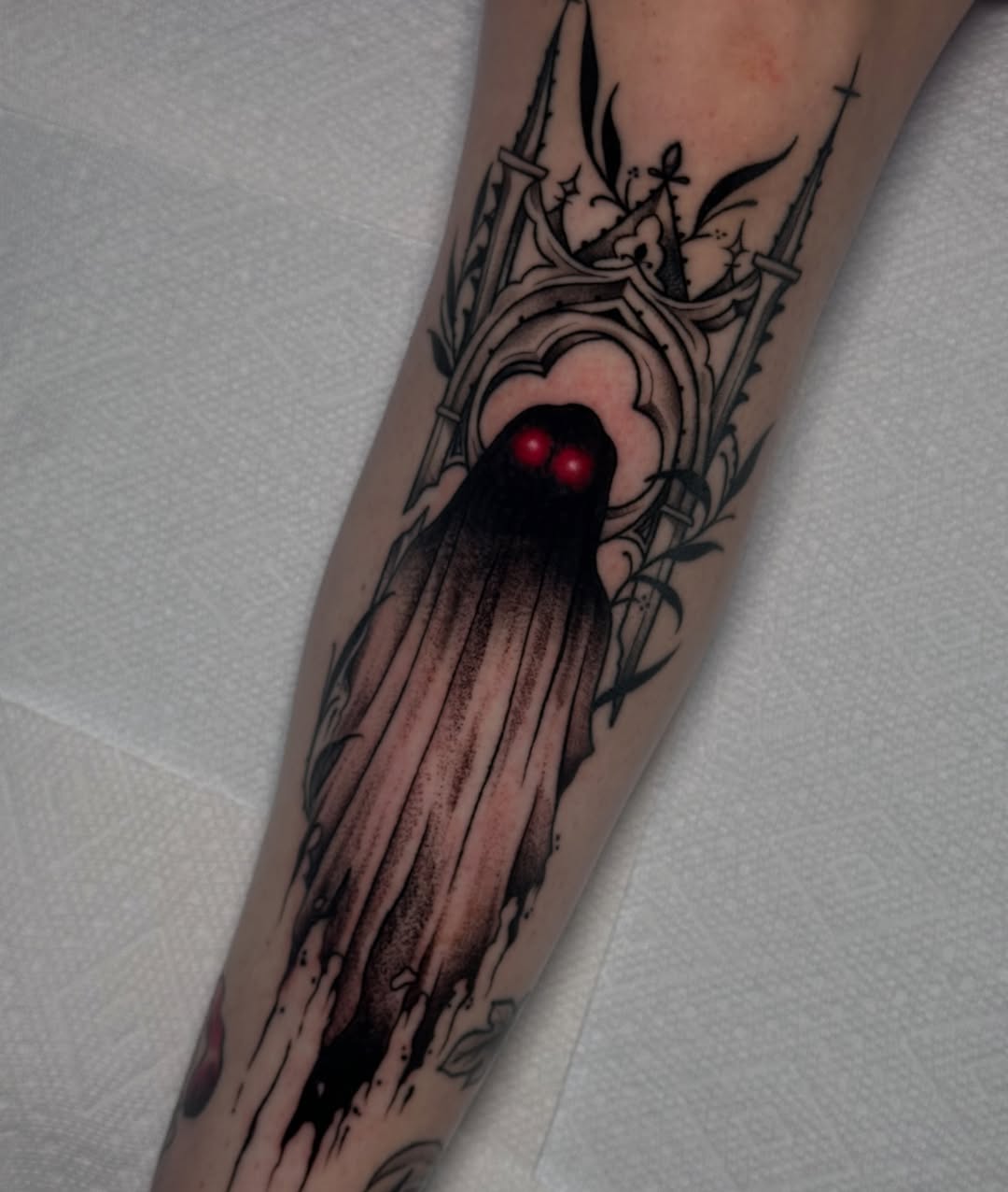 Tattoo by @caitycat.tattoos — black_and_grey, dark_realism
