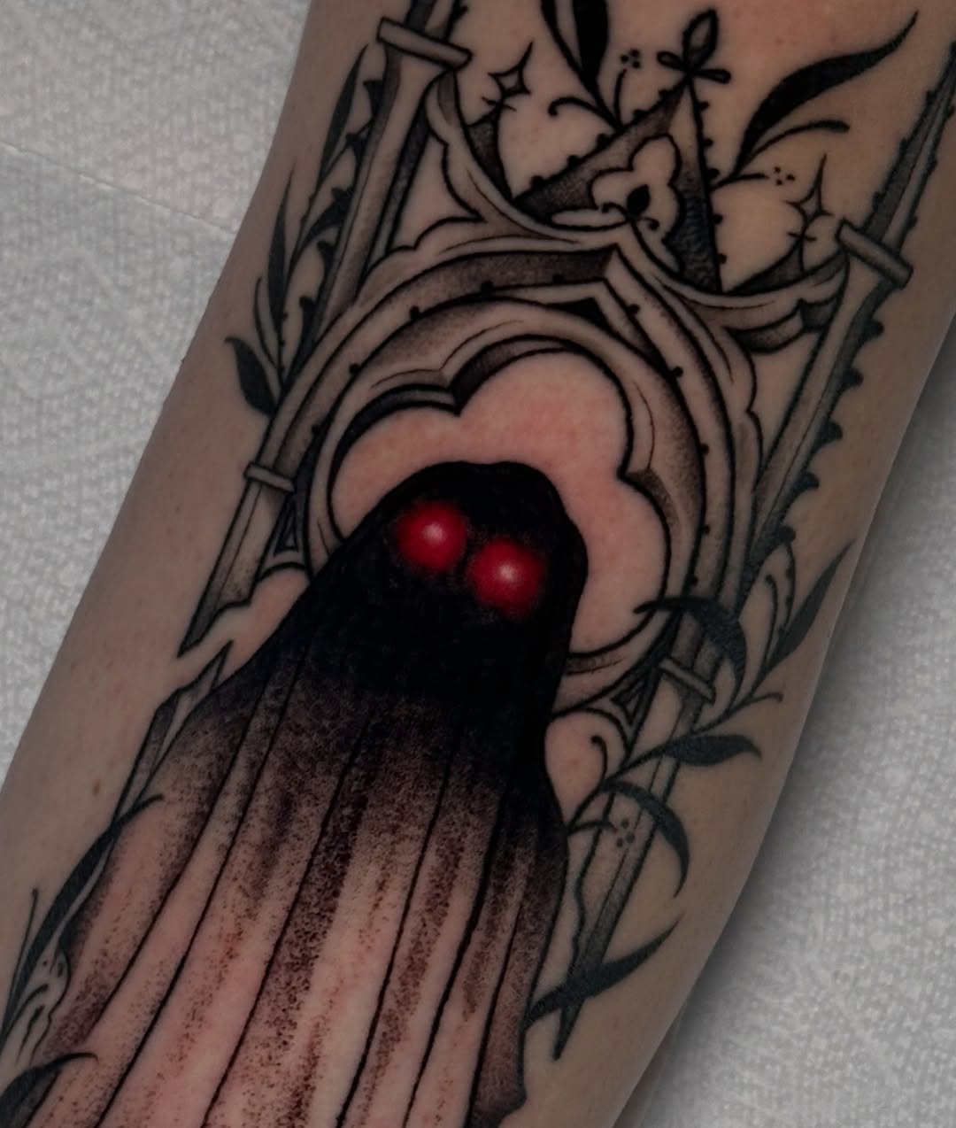 Tattoo by @caitycat.tattoos — dark_realism, black_and_grey