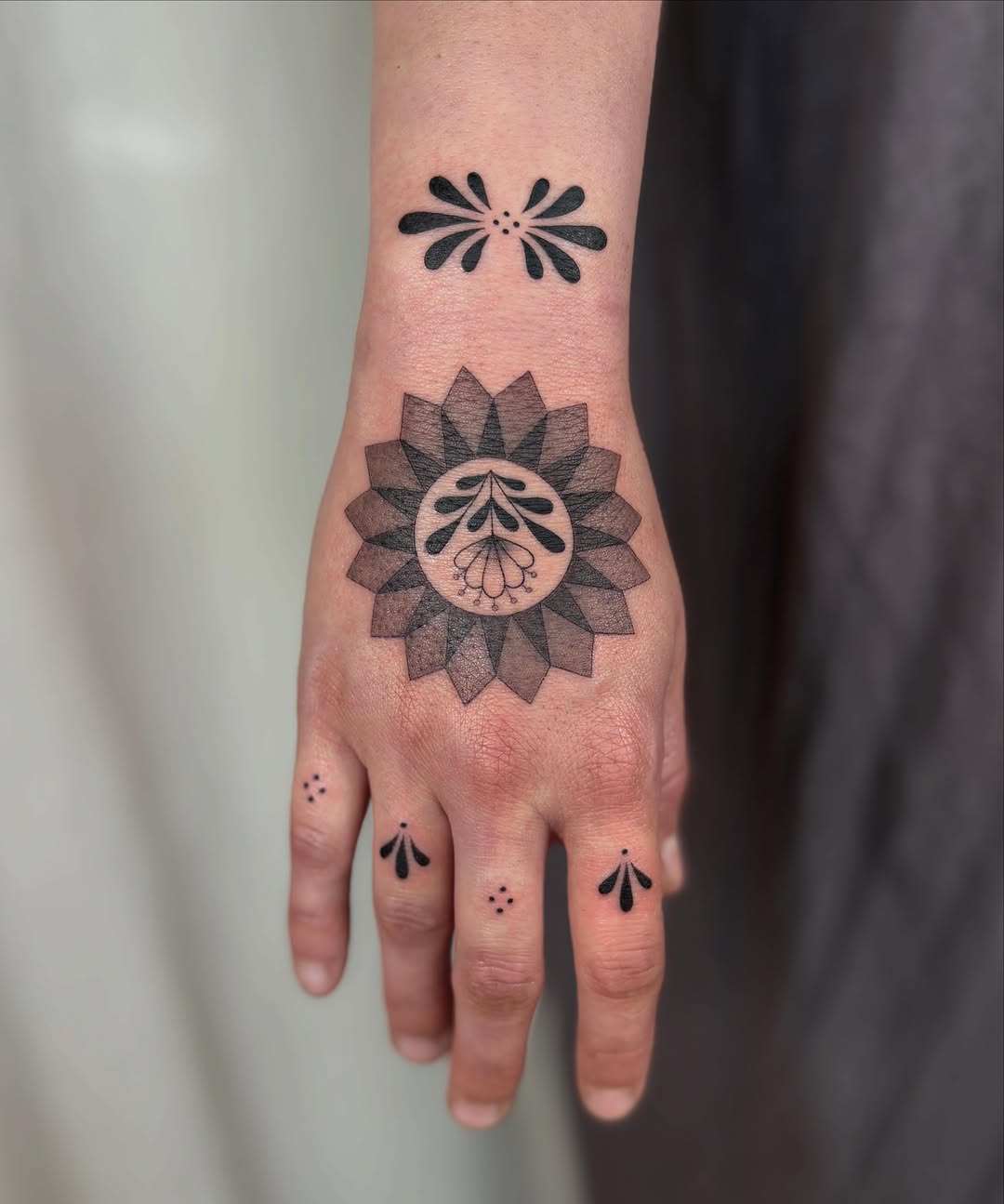 Tattoo by @annasagetattoos — geometric, dotwork
