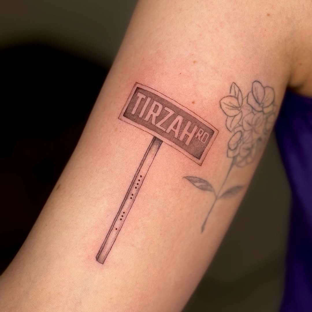 Tattoo by @hansi.ink — lettering_script, black_and_grey