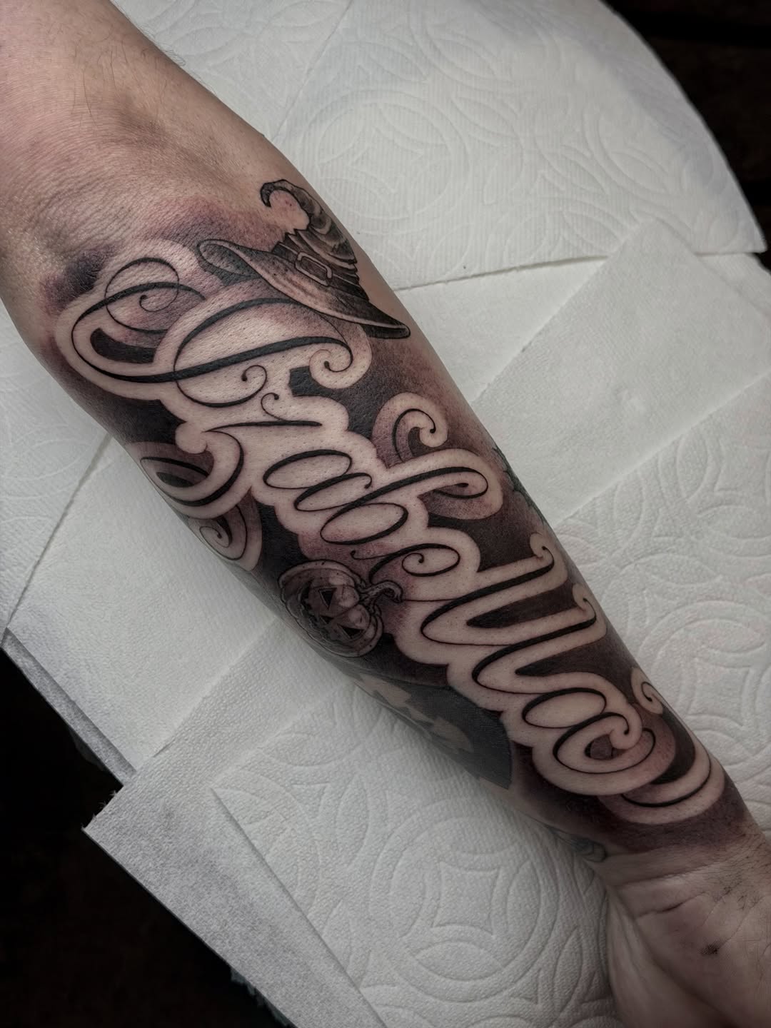 Tattoo by @marcusmartineztattoo β lettering_script, black_and_grey