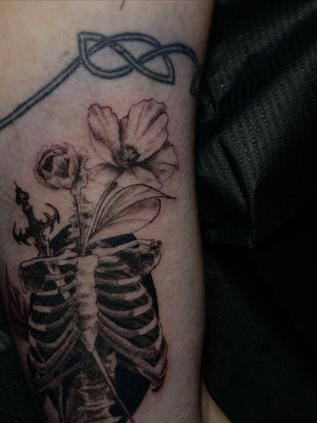 Tattoo by @kay.b.tats — black_and_grey, dark_realism
