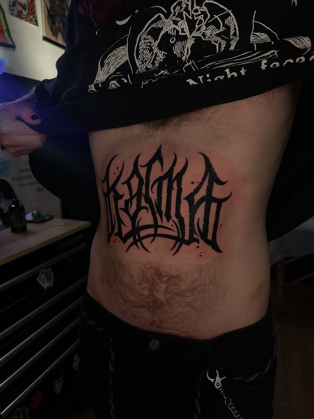 Tattoo by @line_ink — lettering_script, blackwork