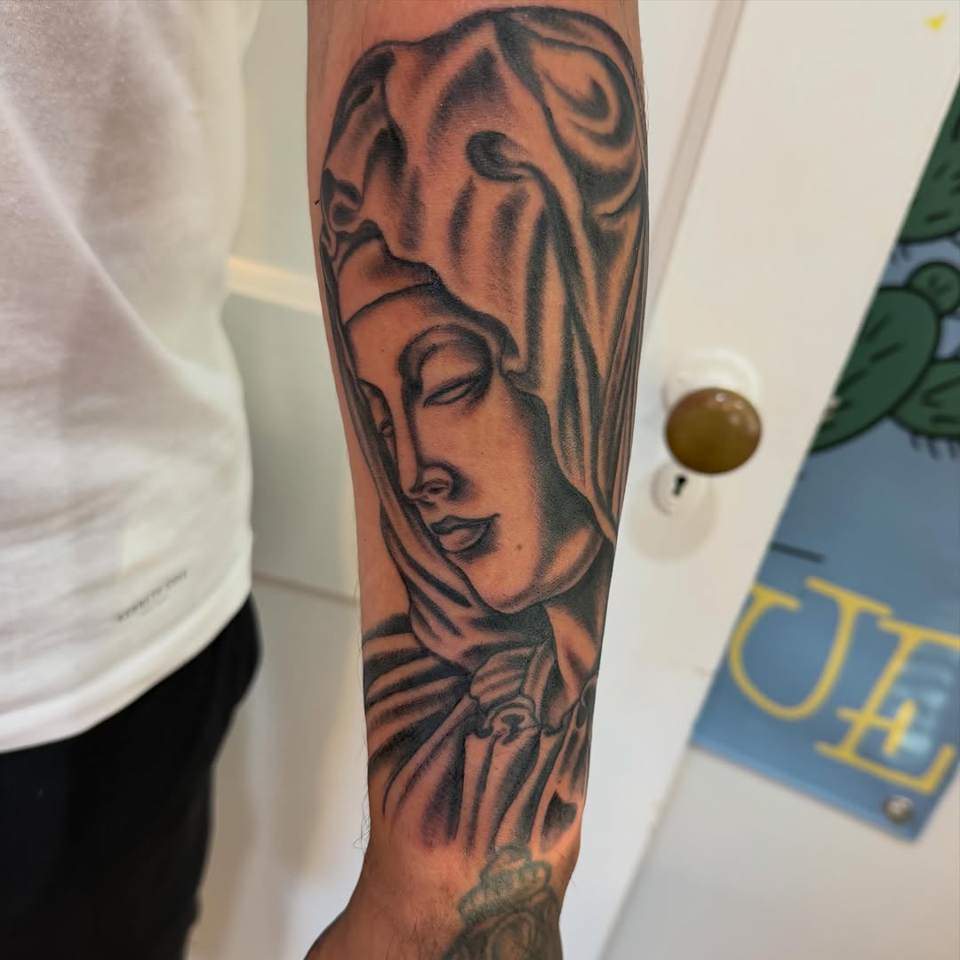 Tattoo by @laurak_musiccitytattoo — black_and_grey, realism