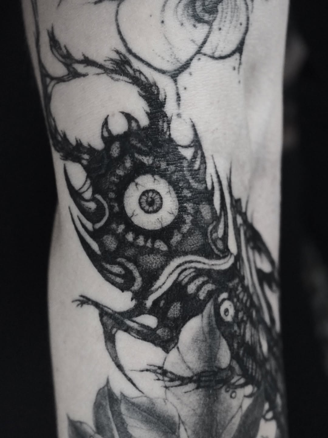 Tattoo by @kikimora.tattoo — black_and_grey, dark_realism
