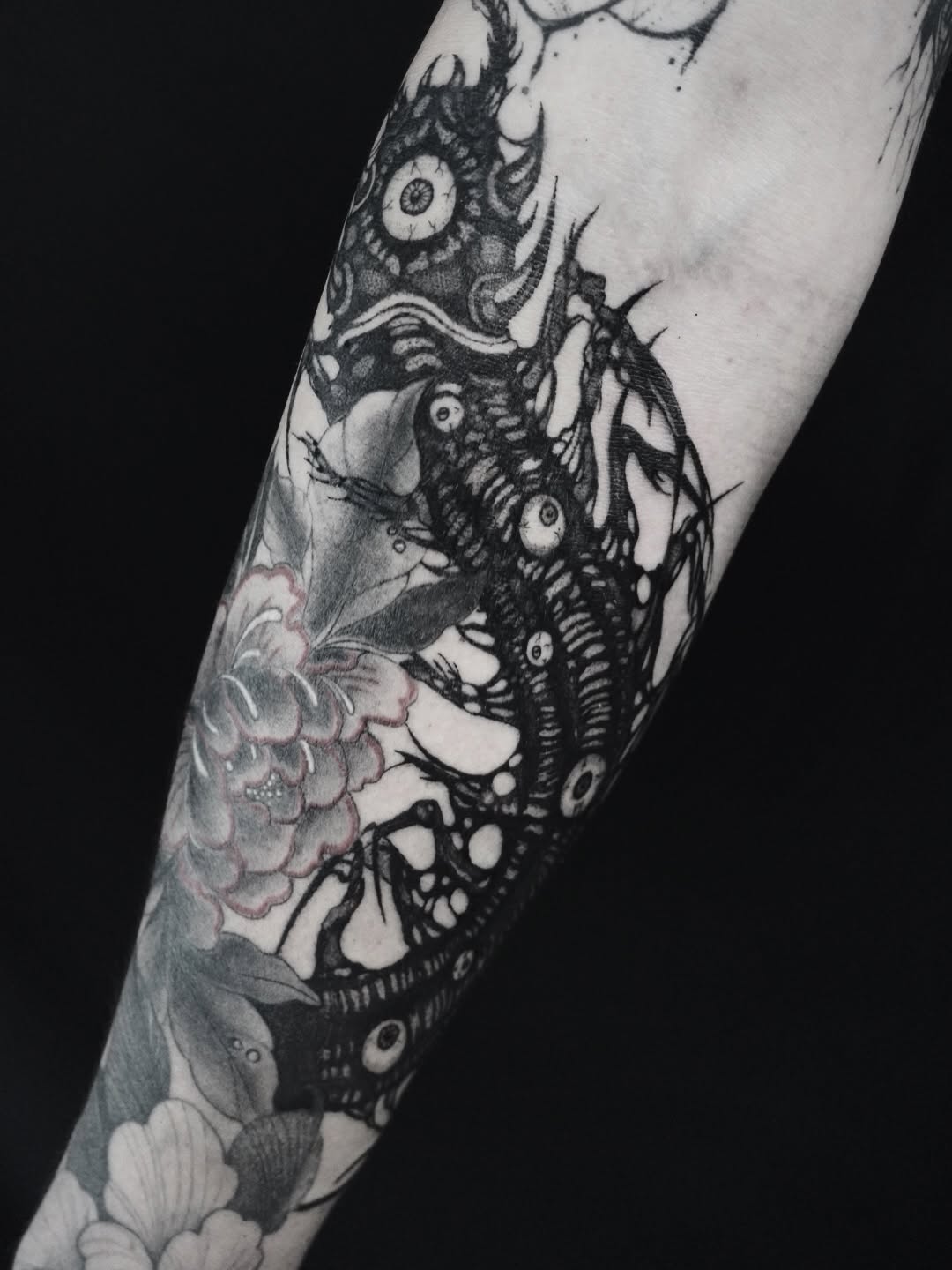 Tattoo by @kikimora.tattoo — black_and_grey, dark_realism