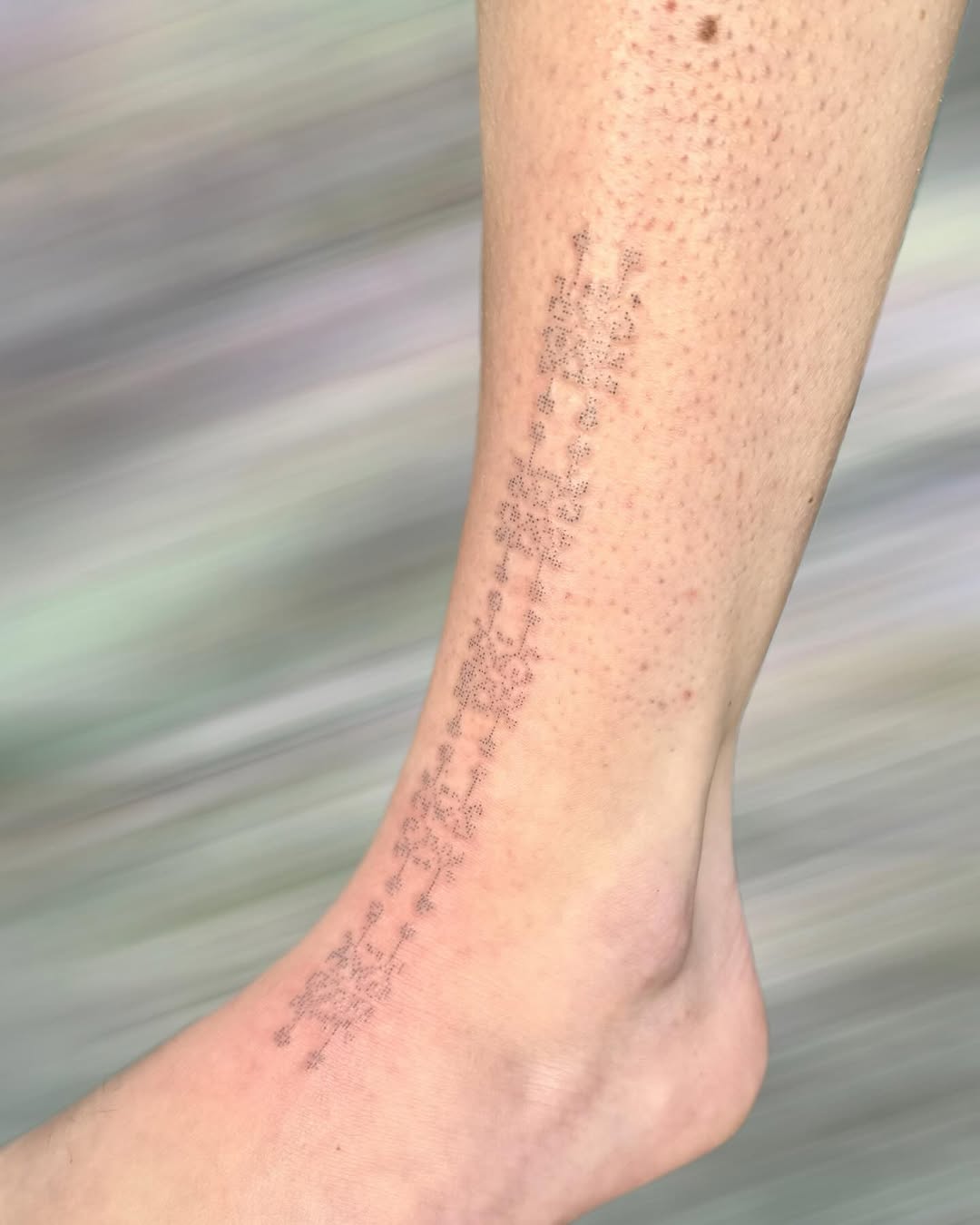 Tattoo by @peachykeentat — dotwork, minimalist