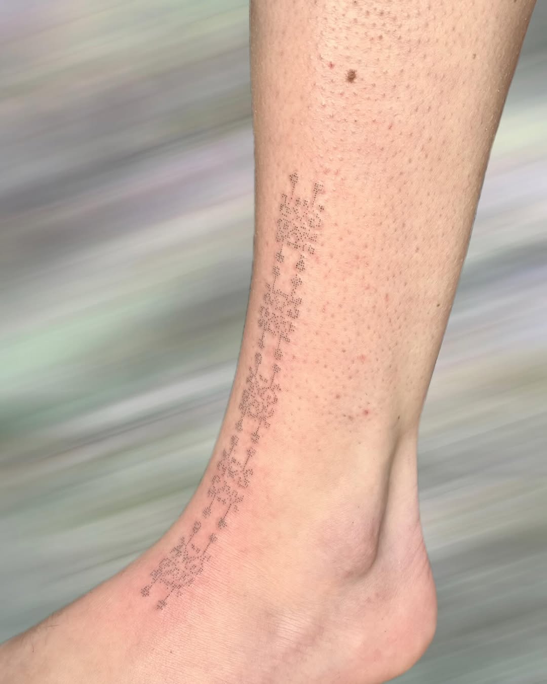 Tattoo by @peachykeentat — dotwork, geometric