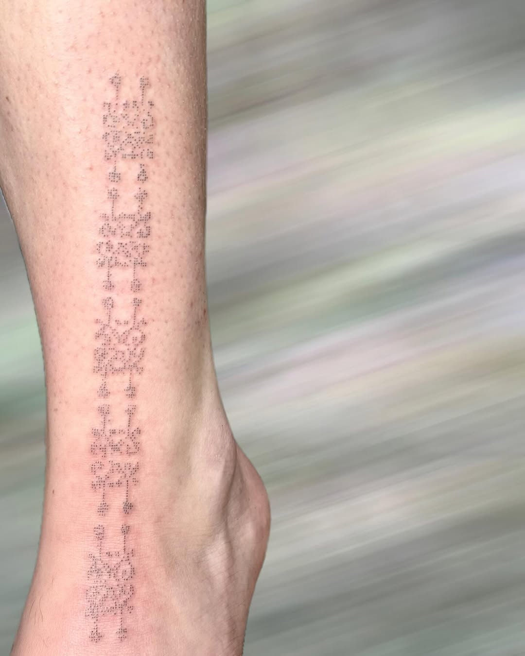 Tattoo by @peachykeentat — dotwork, geometric