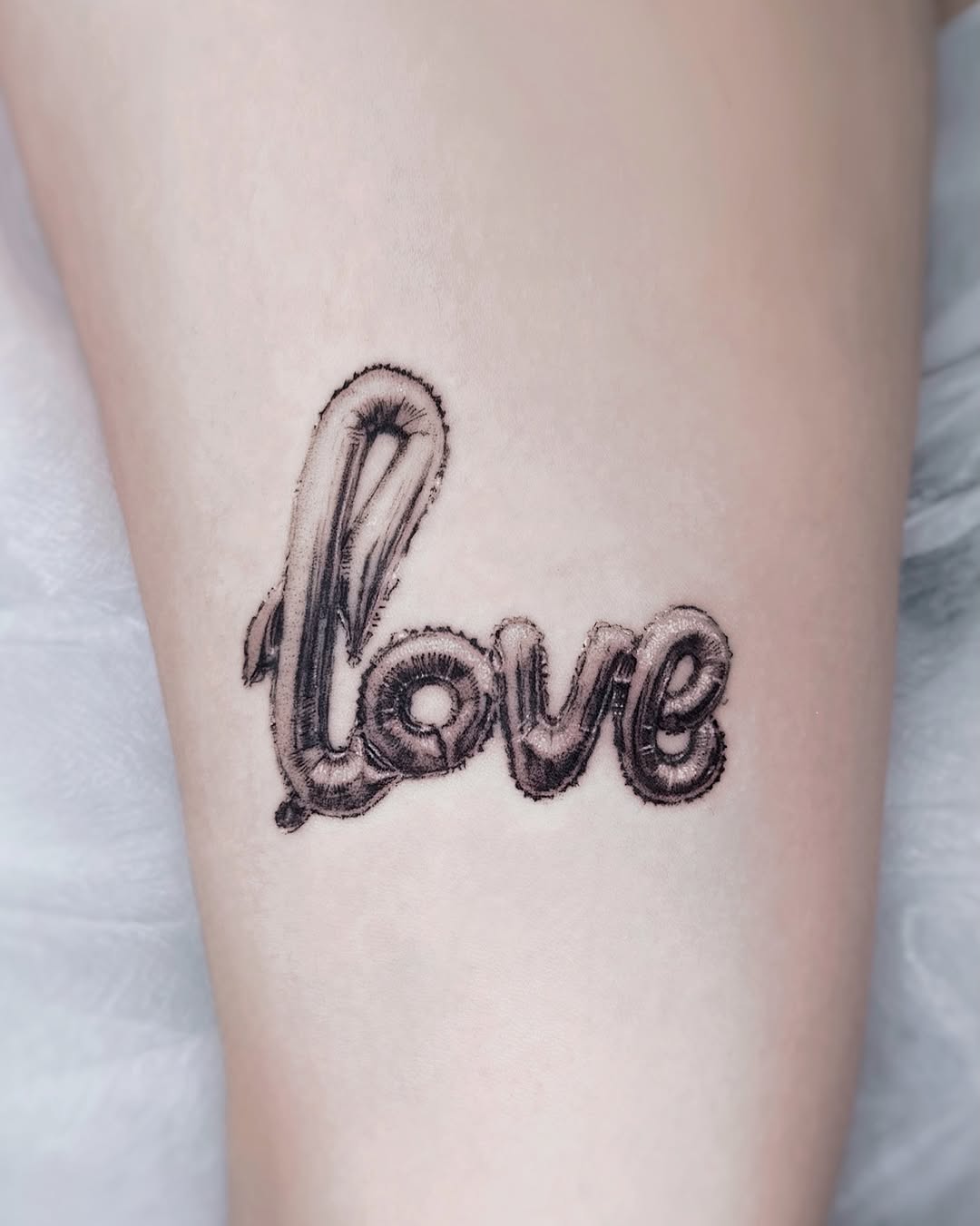 Tattoo by @lucyy.inked โ lettering_script, black_and_grey