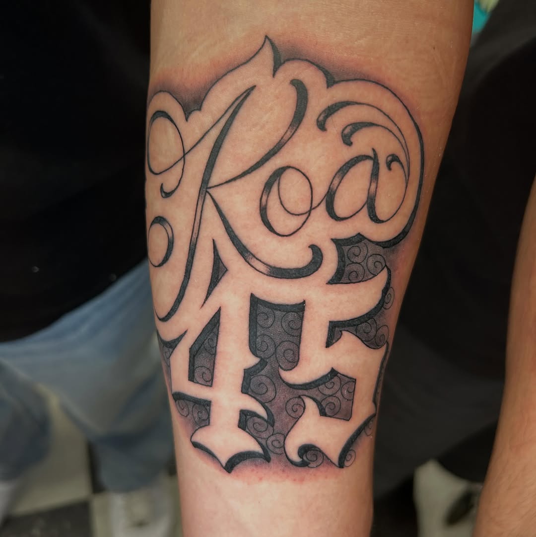Tattoo by @camdentuttletattoos — lettering_script, black_and_grey