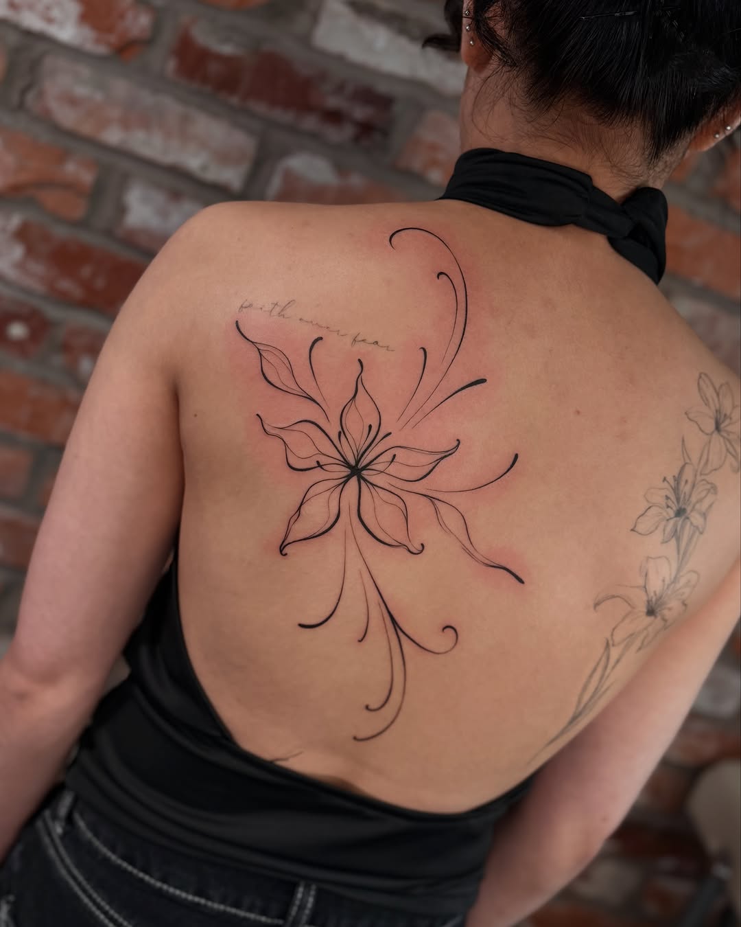 Tattoo by @jane_tattoo.yeg โ fine_line, lettering_script