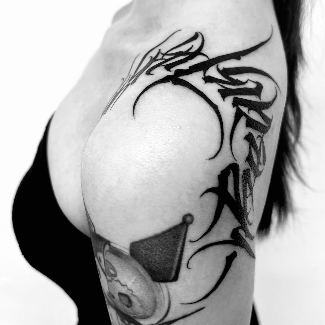Tattoo by @jimyuip — lettering_script, blackwork