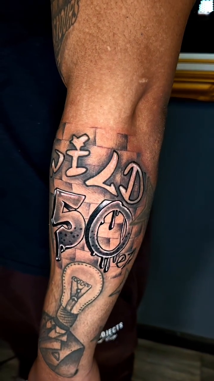 Tattoo by @tattoos.by.rey — black_and_grey, realism