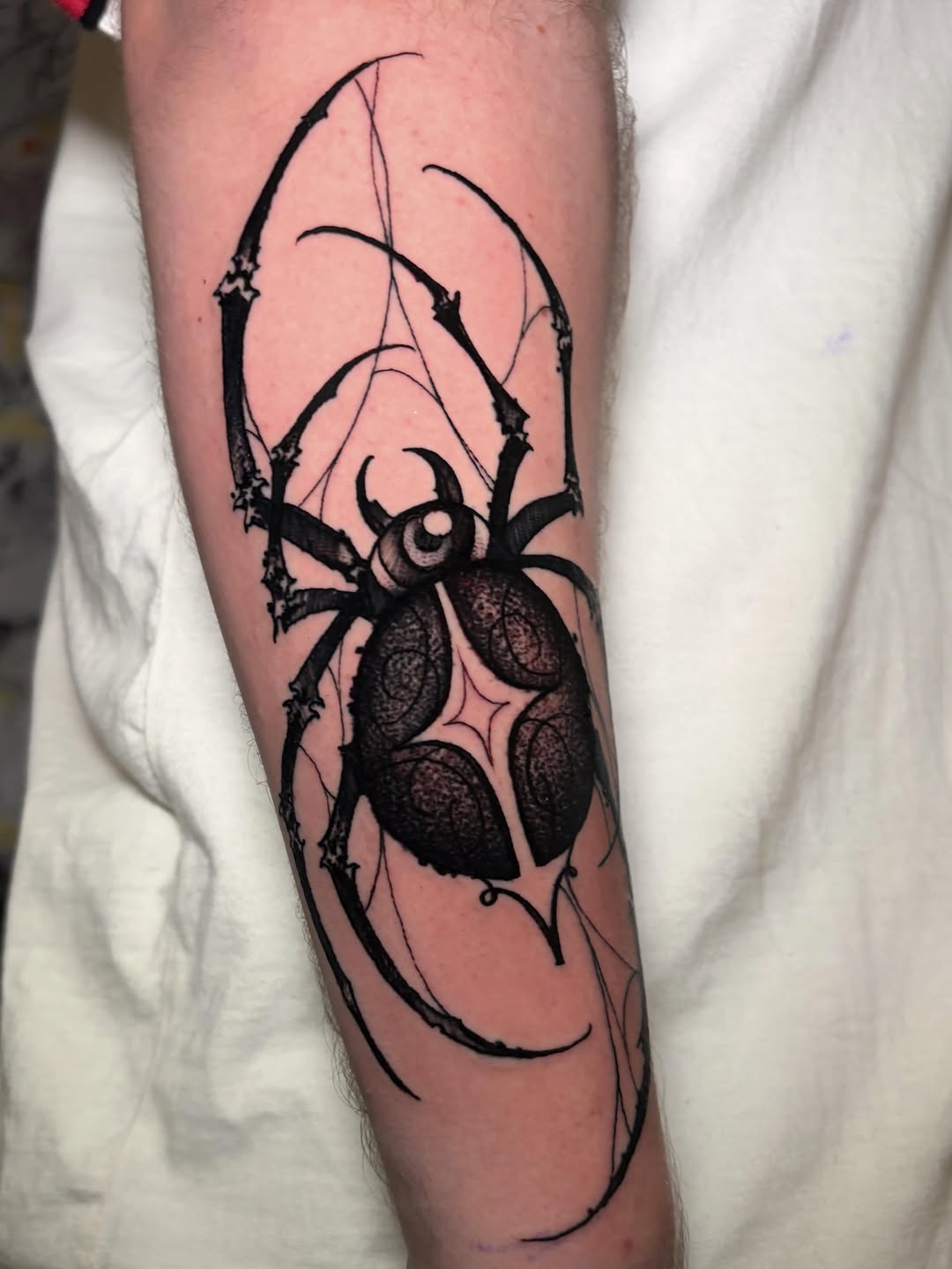 Tattoo by @italoholietattoo — blackwork