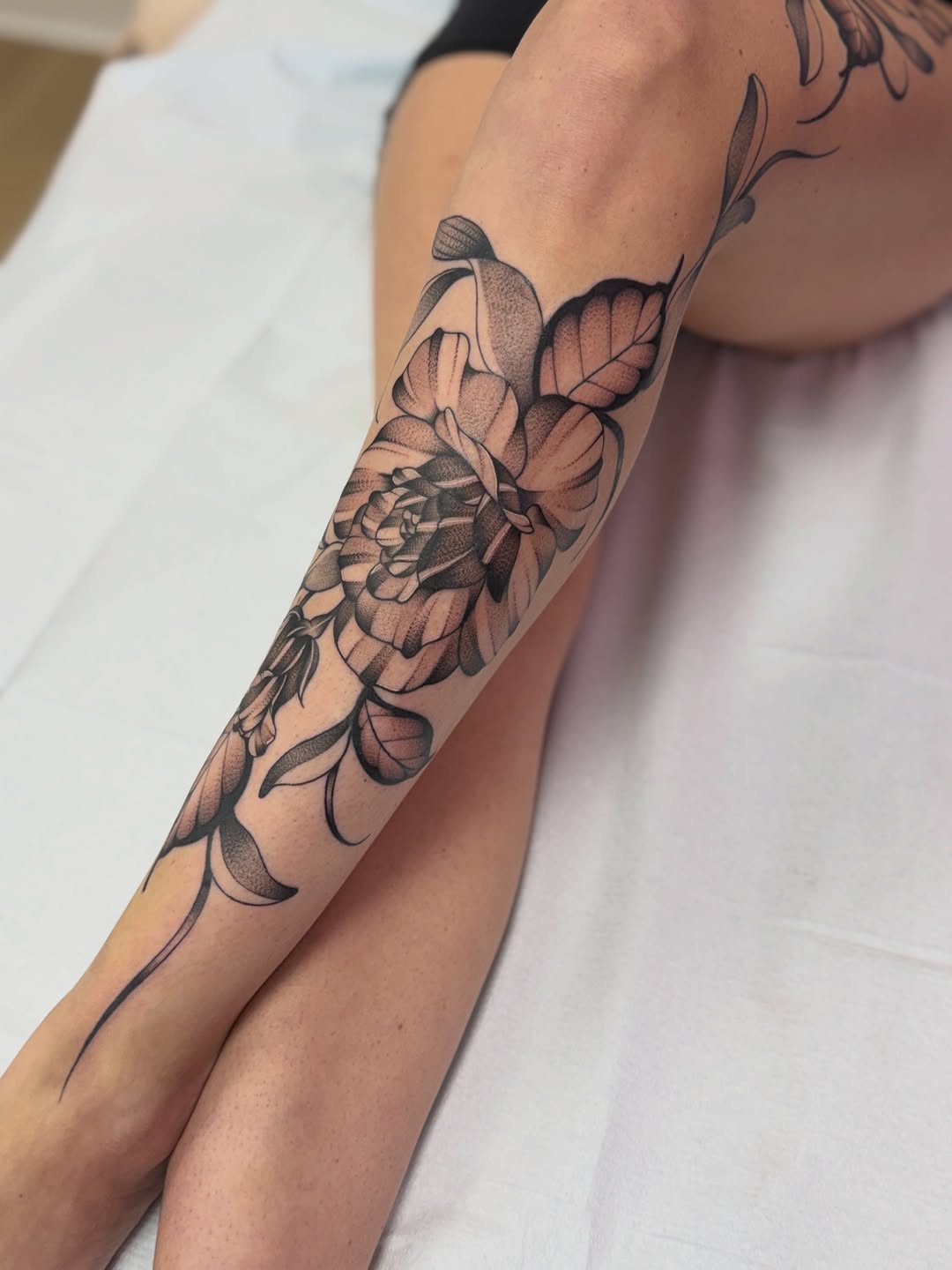 Tattoo by @lilindigotattoo — black_and_grey, dotwork