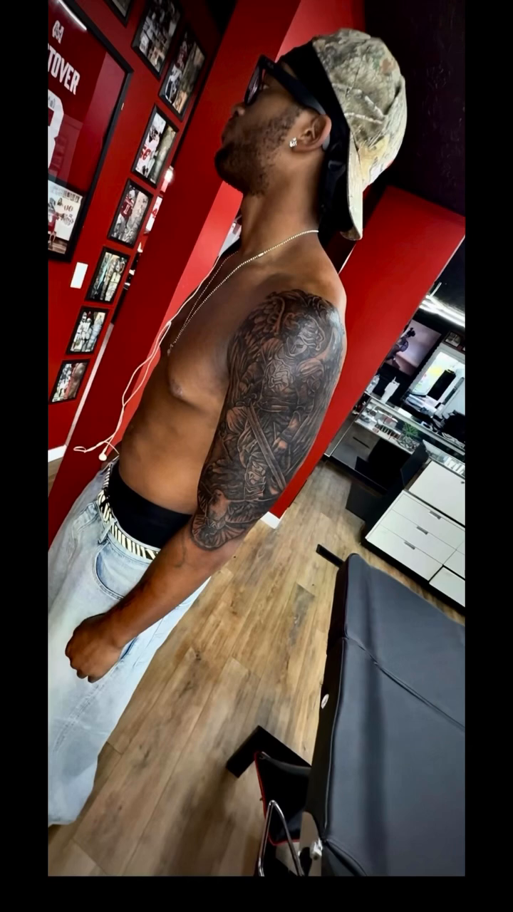 Tattoo by @tatt2t — black_and_grey, realism