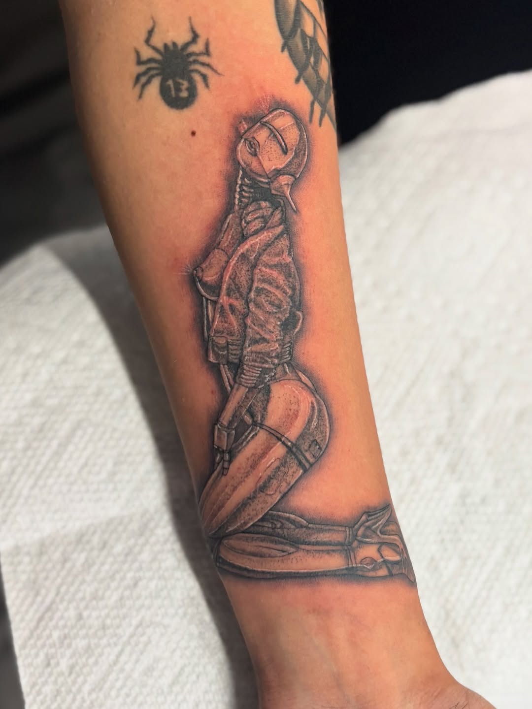 Tattoo by @inked.by.kiwiii โ realism, black_and_grey