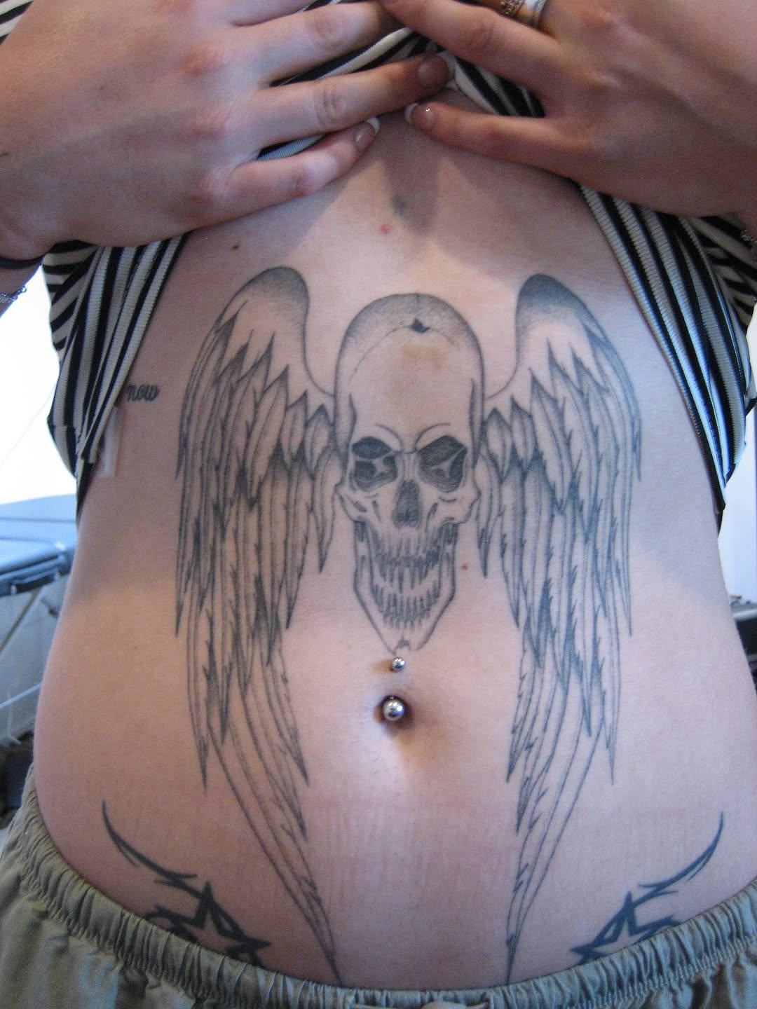 Tattoo by @glue.0000 — black_and_grey, dark_realism