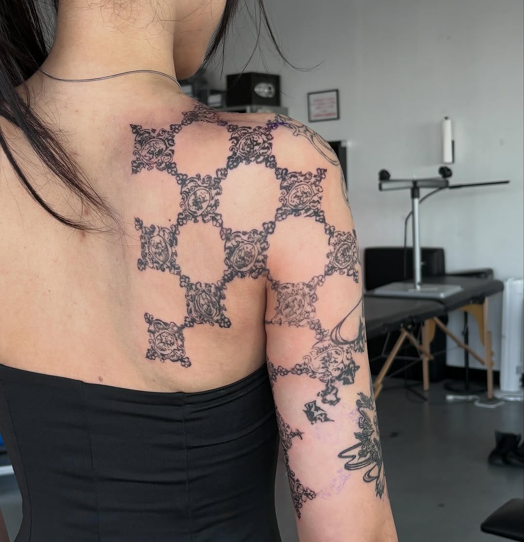 Tattoo by @spikecharms — ornamental, blackwork