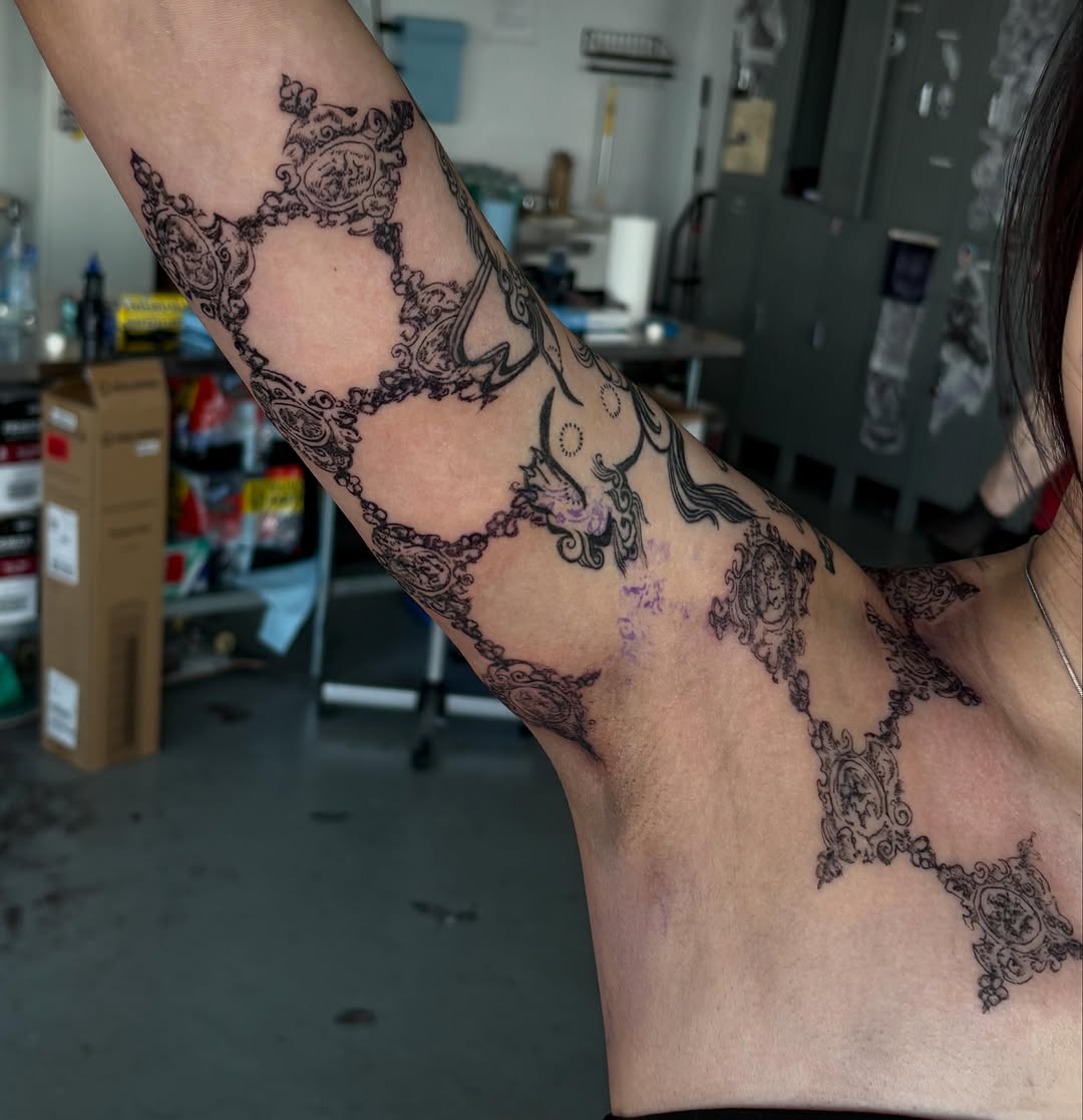 Tattoo by @spikecharms — ornamental, illustrative