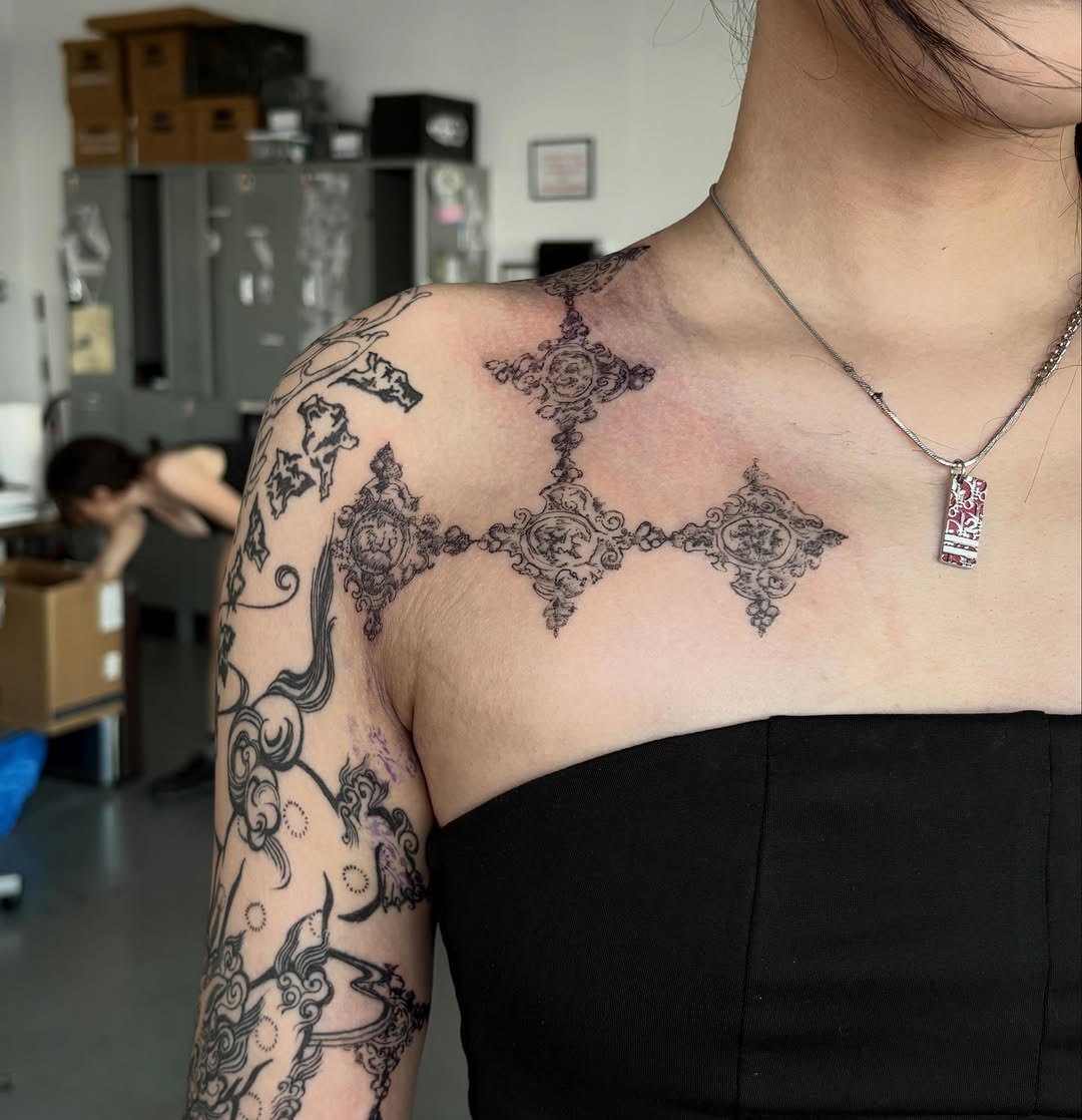 Tattoo by @spikecharms — ornamental, blackwork