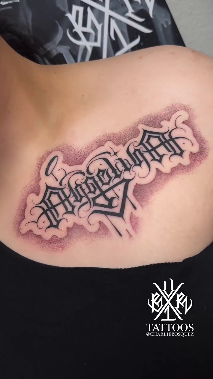 Tattoo by @charliebosquez โ lettering_script, blackwork
