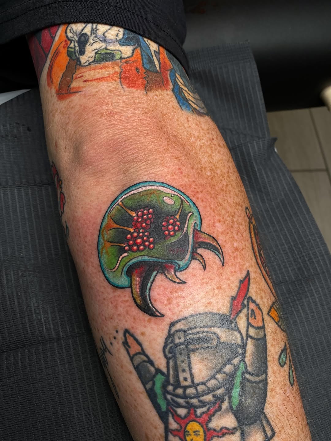 Tattoo by @kaitlin.tattoos — illustrative, new_school