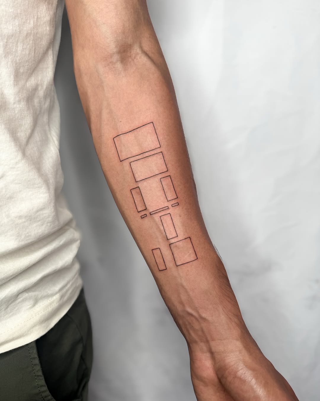 Tattoo by @chyzh.ttt — geometric, minimalist